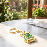 Madina Green Shield Metal Keychain – front view